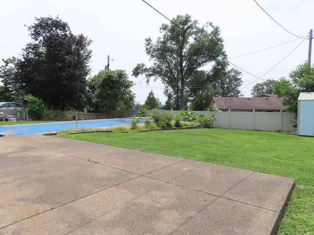3910 Stringtown Rd, Evansville, IN 47711 - view of yard with a patio and a storage shed