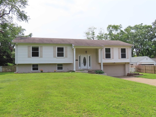 3910 Stringtown Rd, Evansville, IN 47711 - split foyer home featuring a garage and driveway