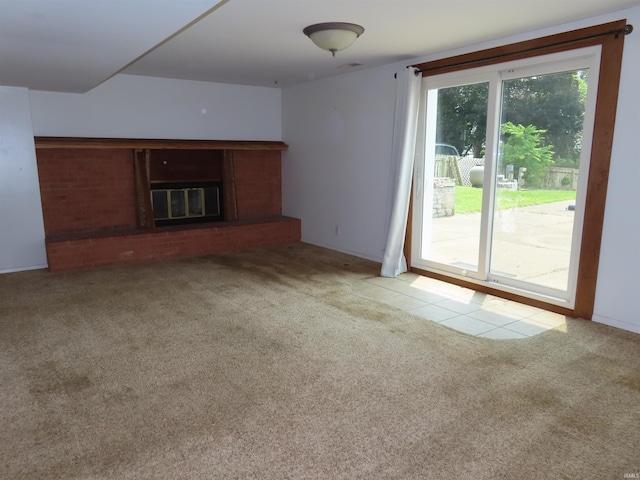 3910 Stringtown Rd, Evansville, IN 47711 - unfurnished living room featuring carpet and a fireplace