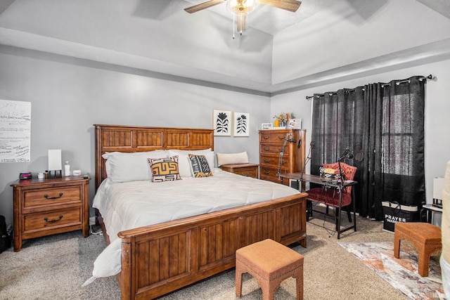 55705 Sichuan Dr, Osceola, IN 46561 - bedroom with light colored carpet, a raised ceiling, and a ceiling fan