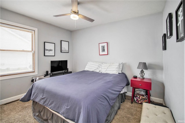 55705 Sichuan Dr, Osceola, IN 46561 - bedroom featuring baseboards, carpet floors, and a ceiling fan