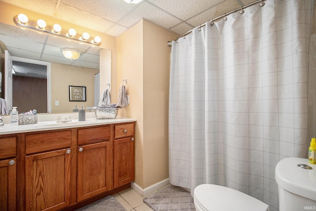 55705 Sichuan Dr, Osceola, IN 46561 - full bathroom with a drop ceiling, toilet, vanity, tile patterned flooring, and curtained shower