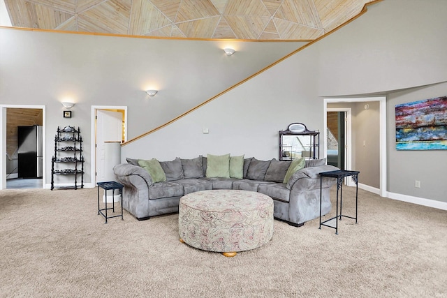 6655 Gopher Dr, Nineveh, IN 46164 - living room with carpet floors, high vaulted ceiling, wood ceiling, and baseboards