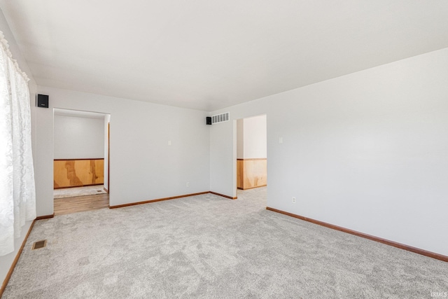 4294 E Defreese Rd, Syracuse, IN 46567 - empty room featuring light colored carpet and baseboards