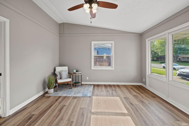 1008 Beck Ln, Lafayette, IN 47909 - unfurnished room featuring lofted ceiling, wood finished floors, ceiling fan, and baseboards