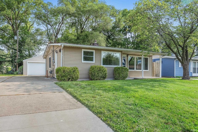 1008 Beck Ln, Lafayette, IN 47909 - view of front of house with an outdoor structure, a front yard, and a detached garage