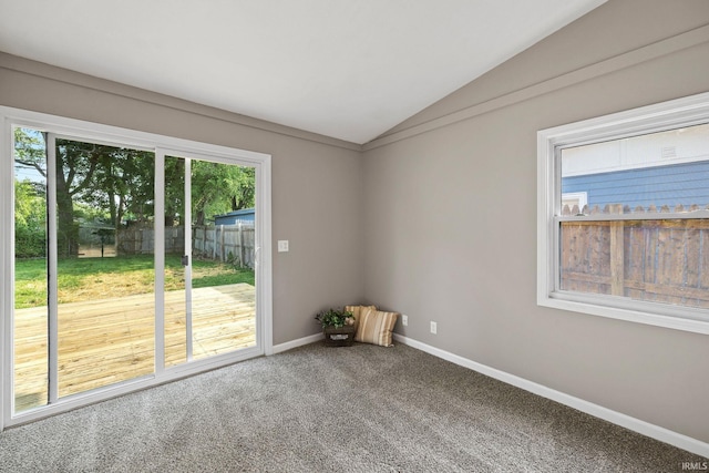 1008 Beck Ln, Lafayette, IN 47909 - spare room featuring lofted ceiling, carpet flooring, and baseboards