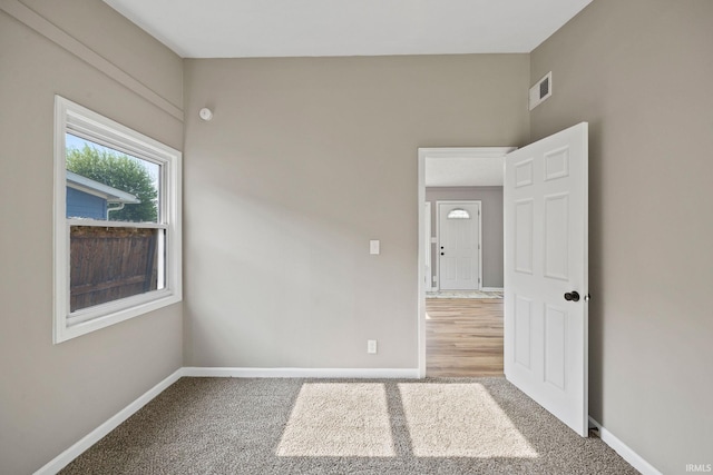 1008 Beck Ln, Lafayette, IN 47909 - spare room featuring carpet and baseboards