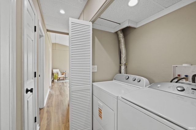 1008 Beck Ln, Lafayette, IN 47909 - laundry area featuring washing machine and clothes dryer, light wood-style floors, and recessed lighting