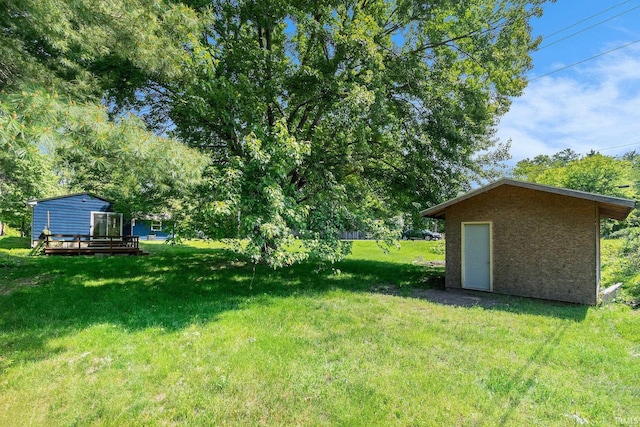 17016 Ruthie Ave, South Bend, IN 46635 - view of green lawn featuring a deck