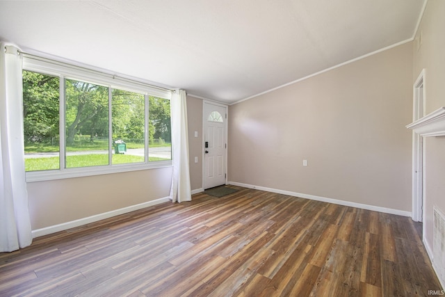 17016 Ruthie Ave, South Bend, IN 46635 - entryway with wood finished floors, baseboards, and ornamental molding