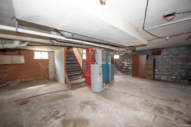 2331 N 24th St, Lafayette, IN 47904 - basement with water heater, stairs, and heating unit