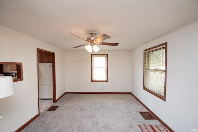 2331 N 24th St, Lafayette, IN 47904 - unfurnished room featuring light colored carpet, ceiling fan, and baseboards