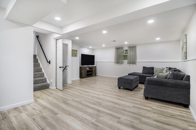 61156 Old Spanish Trl, South Bend, IN 46614 - living area featuring light wood-style flooring, recessed lighting, stairway, and baseboards