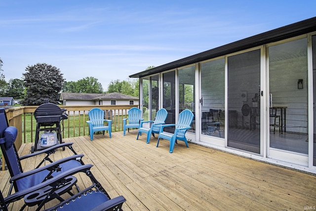 61156 Old Spanish Trl, South Bend, IN 46614 - wooden terrace featuring a sunroom and area for grilling