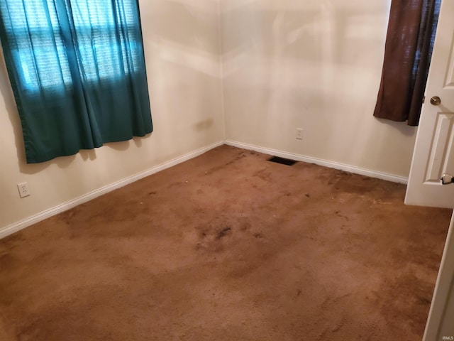 406 W Rogers St, Osceola, IN 46561 - unfurnished room featuring carpet flooring and baseboards