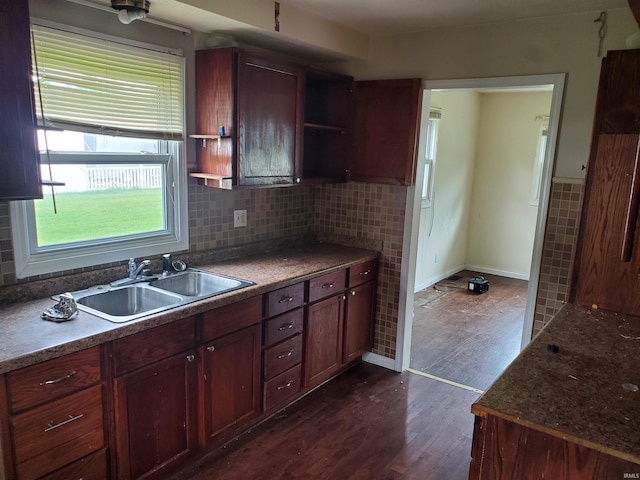 406 W Rogers St, Osceola, IN 46561 - kitchen with a sink, open shelves, and dark wood-style floors