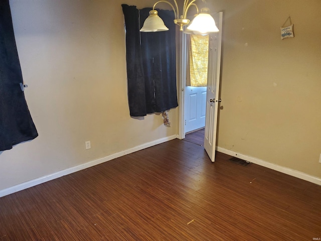 406 W Rogers St, Osceola, IN 46561 - unfurnished room featuring baseboards and wood finished floors