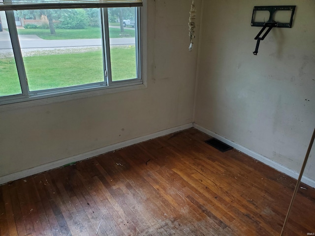 406 W Rogers St, Osceola, IN 46561 - unfurnished room with wood-type flooring and baseboards