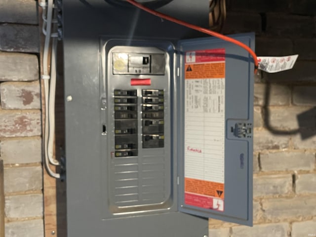 607 N 10th St, Vincennes, IN 47591 - utility room featuring electric panel