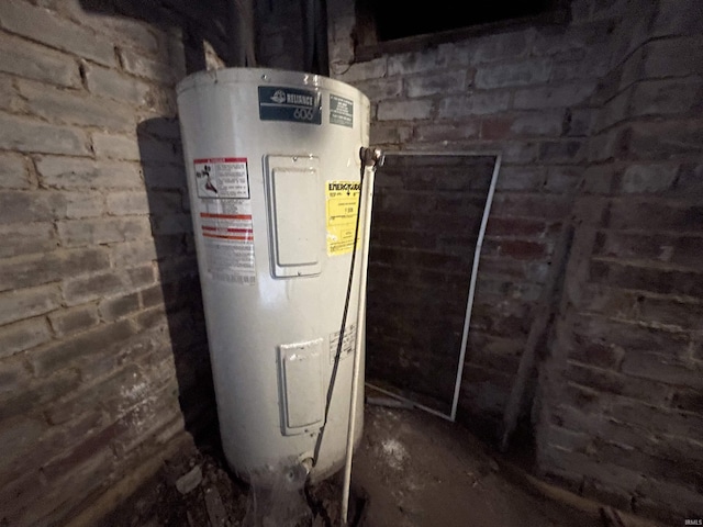 607 N 10th St, Vincennes, IN 47591 - utility room with water heater