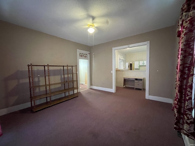 607 N 10th St, Vincennes, IN 47591 - unfurnished bedroom featuring carpet floors, baseboards, ceiling fan, and ensuite bath