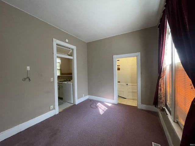 607 N 10th St, Vincennes, IN 47591 - unfurnished bedroom with carpet floors, connected bathroom, and baseboards