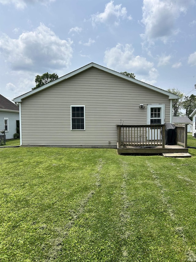 1406 Hillcrest Rd, Bedford, IN 47421 - rear view of house featuring a wooden deck and a yard