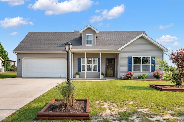 303 Shrack Ln, Dunkirk, IN 47336 - view of front of property with an attached garage, concrete driveway, a front lawn, and a shingled roof