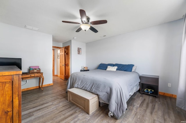 303 Shrack Ln, Dunkirk, IN 47336 - bedroom with wood finished floors, baseboards, and ceiling fan