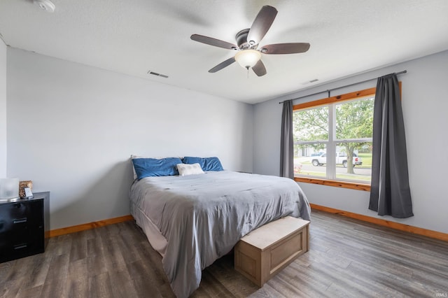303 Shrack Ln, Dunkirk, IN 47336 - bedroom featuring baseboards, wood finished floors, and ceiling fan