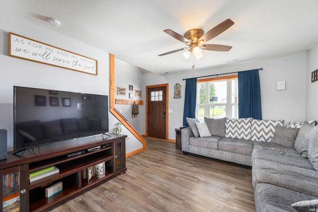 303 Shrack Ln, Dunkirk, IN 47336 - living area featuring wood finished floors, ceiling fan, and baseboards