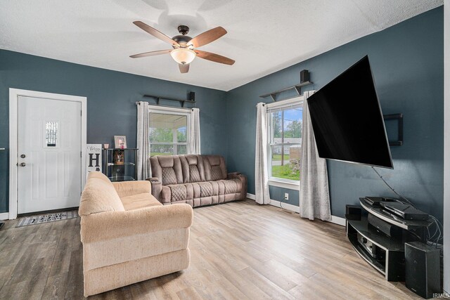 407 N Front St, North Manchester, IN 46962 - living area featuring ceiling fan, wood finished floors, and plenty of natural light