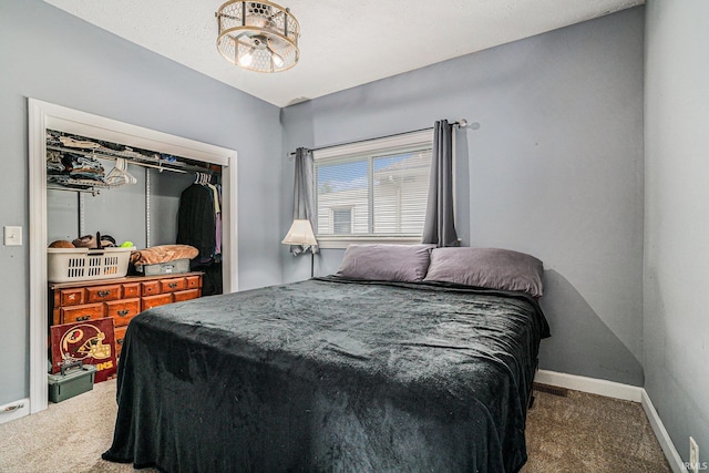 407 N Front St, North Manchester, IN 46962 - bedroom with carpet floors, baseboards, a closet, and a chandelier