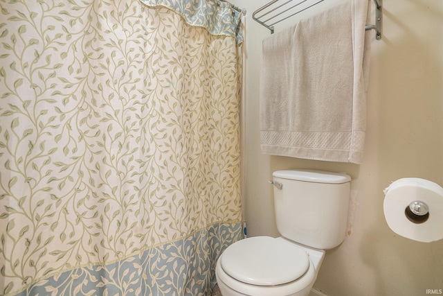 17411 Woodhurst Rd, Granger, IN 46530 - full bathroom featuring toilet and a shower with shower curtain