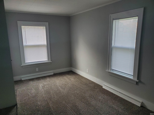 1005 E 4th St, Mishawaka, IN 46544 - unfurnished room featuring a baseboard heating unit, crown molding, carpet flooring, and baseboards