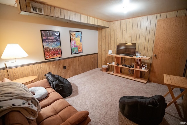 12350 Cedar Rd, Bourbon, IN 46504 - living area featuring carpet flooring and wooden walls
