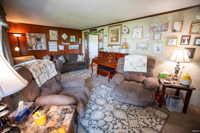 12350 Cedar Rd, Bourbon, IN 46504 - living room with carpet flooring, wood walls, and crown molding