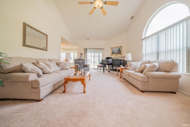 1843 Valley View Dr, Kokomo, IN 46902 - carpeted living room with high vaulted ceiling, ceiling fan, and healthy amount of natural light