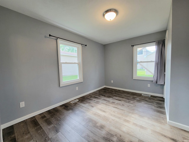 1702 Milburn Blvd, Mishawaka, IN 46544 - empty room with wood finished floors and baseboards
