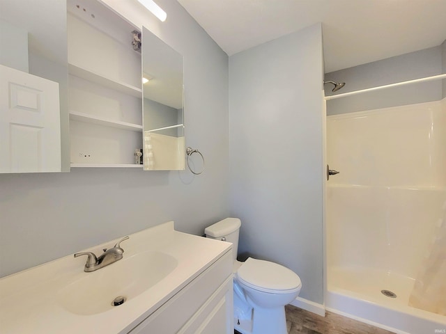 1702 Milburn Blvd, Mishawaka, IN 46544 - bathroom with a shower, vanity, toilet, and wood finished floors
