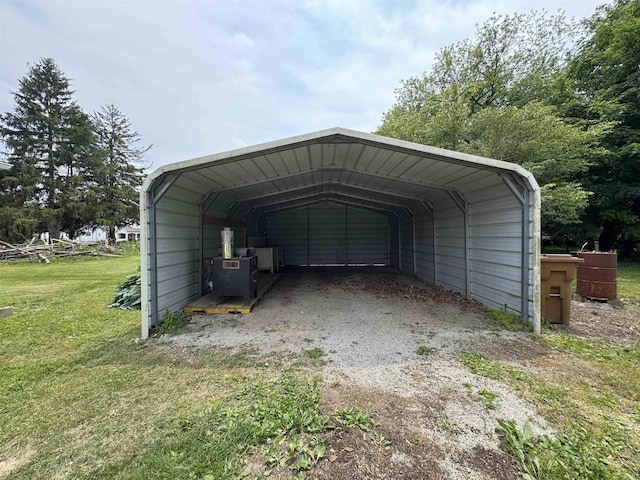 1114 N College St, Veedersburg, IN 47987 - view of parking with a carport