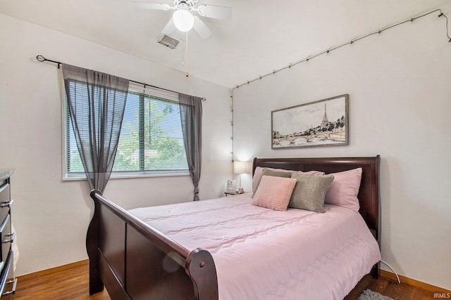 5209 Sunnyfield Pl, South Bend, IN 46619 - bedroom featuring wood finished floors, a ceiling fan, and baseboards