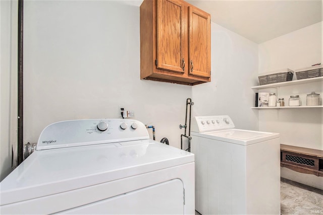 5209 Sunnyfield Pl, South Bend, IN 46619 - laundry room with cabinet space and independent washer and dryer