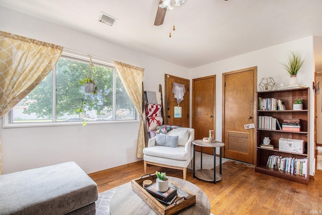 5209 Sunnyfield Pl, South Bend, IN 46619 - living area featuring wood finished floors and ceiling fan