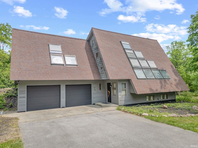411 N 400 W, West Lafayette, IN 47906 - view of front of home featuring an attached garage and driveway