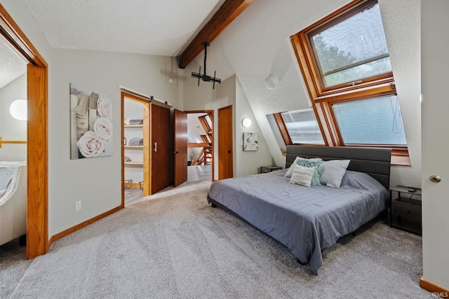 411 N 400 W, West Lafayette, IN 47906 - bedroom featuring a barn door, carpet floors, baseboards, and a textured ceiling