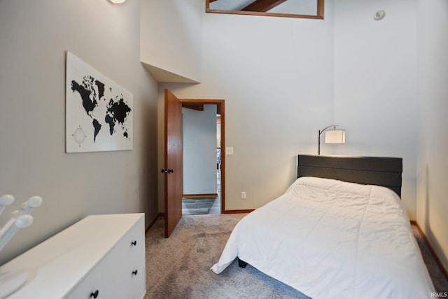 411 N 400 W, West Lafayette, IN 47906 - carpeted bedroom featuring a towering ceiling and baseboards