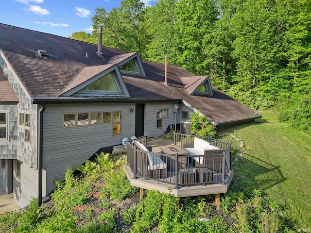411 N 400 W, West Lafayette, IN 47906 - back of property with a deck, outdoor dining space, a yard, and a shingled roof