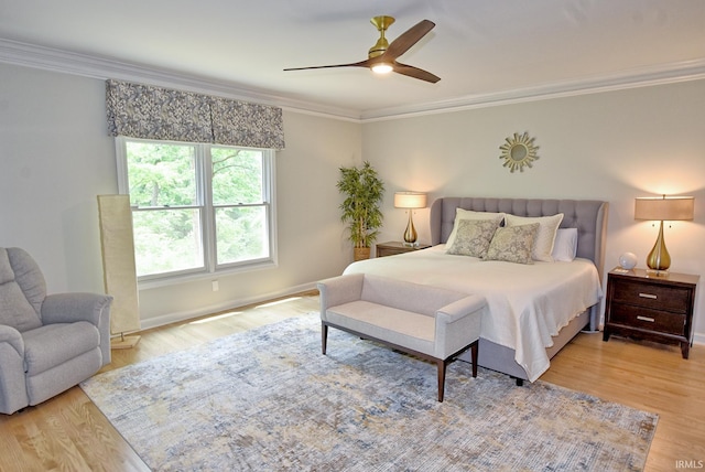11130 Summitree Ct, Evansville, IN 47725 - bedroom with light wood finished floors, crown molding, a ceiling fan, and baseboards